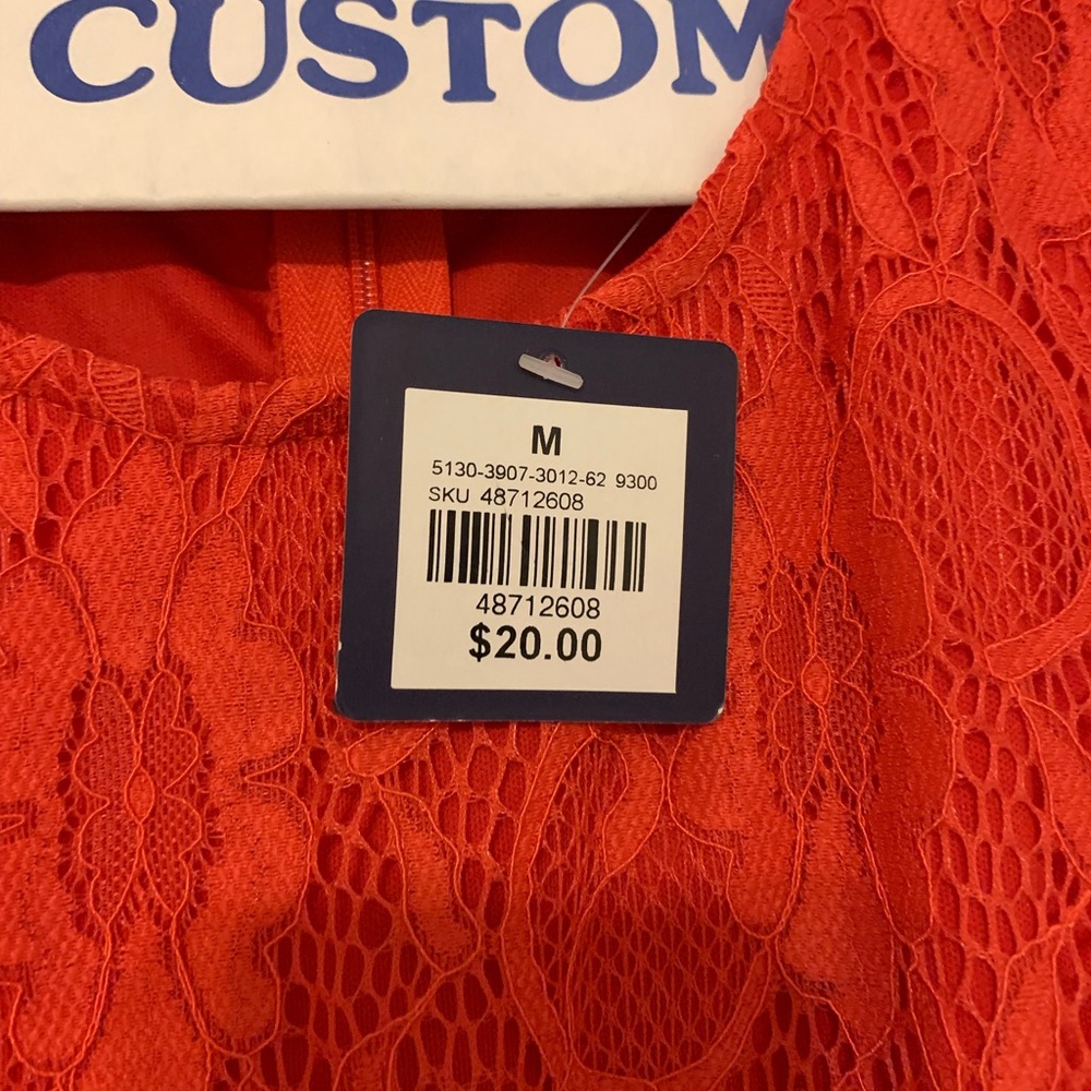No sleeve lace dress in both coral and royal blue